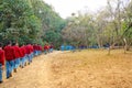 Group of Students walking through a forest as part of Environment conservation campaign in Imphal Manipur India