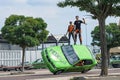 Group of stuntmen on the roof of a car at a car show in Halle Saale, Germany, 04.082019