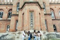 Group of stylish young african university students on campus. Multiracial young people standing together against wall in college Royalty Free Stock Photo