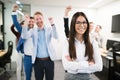 Group of successful business people happy in office