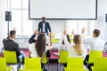 Group of successful business people at the lecture asking questions during team seminar Royalty Free Stock Photo