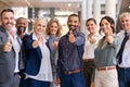 Group of successful business people showing thumbs up Royalty Free Stock Photo