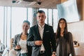 Group of successful business people standing together at office. Royalty Free Stock Photo