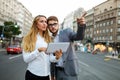 Group of successful business people working, walking in a city street. Royalty Free Stock Photo