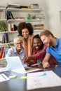 Group of successful happy multiethnic business people working as a team in office on meeting. Royalty Free Stock Photo