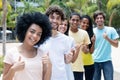 Group of successful multi ethnic young adults in line Royalty Free Stock Photo