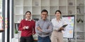 Group of successful multiethnic young business asian team in office Royalty Free Stock Photo