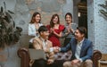 Group of successful partner Asian businesspeople wearing formal clothes, making handshaking for dealing agreement or contract whil Royalty Free Stock Photo