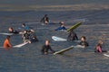 A group of surfers wait for the wave Royalty Free Stock Photo