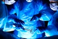 Group of surgeons in masks performing operation. Medicine, surgery and emergency help concepts Royalty Free Stock Photo