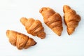 Group of sweet croissant . French morning breakfast . Top view