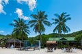 Group of table and chair setting in restaurant bar on the white sandy beach at Thailand Royalty Free Stock Photo