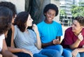 Group of talking african american and latin and caucasian people