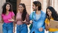 Group of talking hispanic and african american students Royalty Free Stock Photo