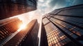 a group of tall buildings with the sun shining through them Royalty Free Stock Photo