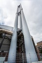 Group of 3 tall steel chimneys in Hamburg, Germany