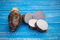 Group of Taro Root on wooden Background Royalty Free Stock Photo