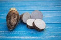 Group of Taro Root on wooden Background Royalty Free Stock Photo