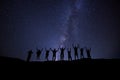 happy team at night skyscape milkyway