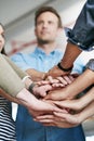Group, team and unity with hands together at office for collaboration, synergy or agreement. Closeup of people or Royalty Free Stock Photo