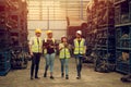 Group of Teamwork Worker mix race enjoy team working in heavy industry factory standing help together smiling happy