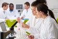 Group Of Technicians Working In Laboratory Royalty Free Stock Photo