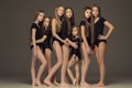 The group of teen girls posing at white studio Royalty Free Stock Photo