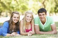 Group Of Teenage Friends Having Fun In Park