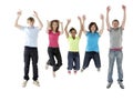 Group of Teenage Friends Jumping in Studio Royalty Free Stock Photo