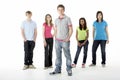 Group of Teenage Friends in Studio Royalty Free Stock Photo