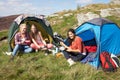 Group Of Teenage Girls On Camping Trip In Countryside