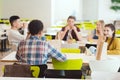 group of teenage students chatting while taking lunch Royalty Free Stock Photo