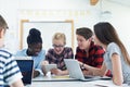 Group Of Teenage Students Collaborating On Project In IT Class Royalty Free Stock Photo