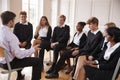 Group Of Teenage Students Having Discussion With Tutor Royalty Free Stock Photo