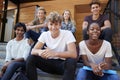 Group Of Teenage Students Socialising On College Campus Together Royalty Free Stock Photo