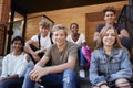 Group Of Teenage Students Socialising On College Campus Together Royalty Free Stock Photo