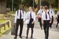 Group Of Teenage Students In Uniform Outside School Buildings Royalty Free Stock Photo