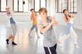 Group teenagers dancing hip-hop indoors Royalty Free Stock Photo