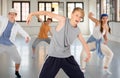 Group teenagers dancing hip-hop indoors Royalty Free Stock Photo