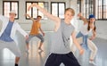 Group teenagers dancing hip-hop indoors Royalty Free Stock Photo