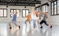 Group teenagers dancing hip-hop indoors Royalty Free Stock Photo