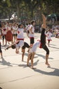 A group of teenagers doing a gymnastic display