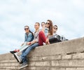 Group of teenagers hanging outside