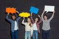 group of teenagers holding blank speech bubbles over heads