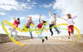 Group of teenagers jumping Royalty Free Stock Photo