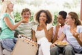 Group Of Teenagers Sitting On A Couch