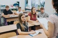 Teenagers Sitting At School Desks During Math Class Lessons