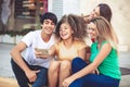 Group of teenagers on the street with CellPhones