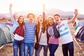 Group of teenagers at summer music festival, sunny day Royalty Free Stock Photo