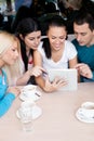 Group of teenagers using tablet touch Royalty Free Stock Photo